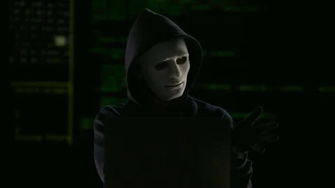 Hacker in mask and gloves breaking government servers, threat of terrorism Video stock 84115074
