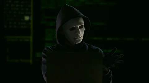 Hacker in mask and gloves breaking government servers, threat of terrorism Video stock 84117076