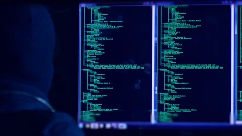 Hacker with mask breaking code. Stock Footage 71920674