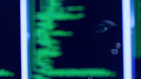 Hacker with mask breaking code. Stock Footage 71926271
