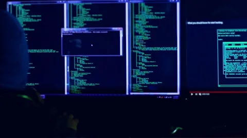 Hacker with mask breaking code. Stock Footage 71929914