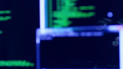 Hacker with mask breaking code. Stock Footage 71933569