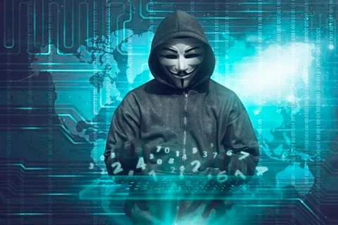 Hacker in mask typing keyboard hacking binary data 库存照片