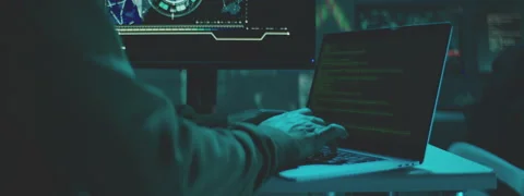 Hacker in a modern workplace Stock Footage 149247657