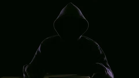 Hacker opening laptop to check virus breaking system codes, stealing data Stock Footage 84115416