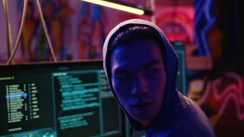 Hacker paranoid while developing spyware Video stock 256944601