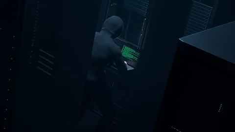 A hacker performing unauthorized server access Business database attack Stock Footage 126290647