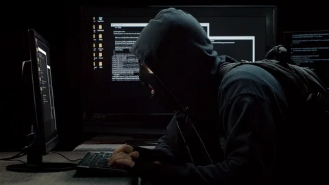 Hacker Profile Infiltrating Computer for Information Stock Footage 115834781