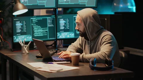 Hacker programmer coding system late at night Video stock 229334613