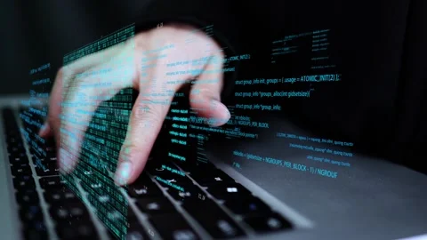 Hacker programmer hacks into network system Stock Footage 198983875