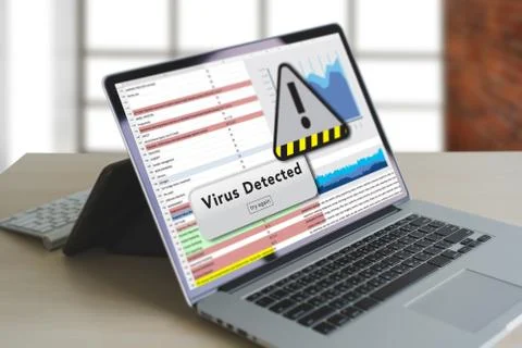 Hacker Protection Concept Man working on laptop Virus Detected Alert Digital  Stock-Fotos