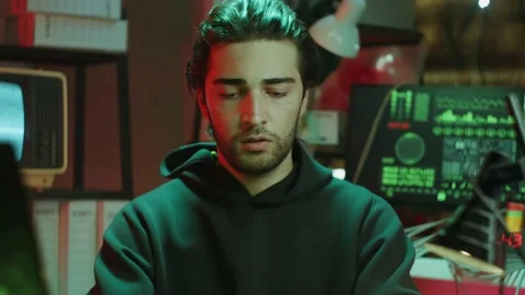 Hacker putting on glasses, typing on keyboard, preparing to break password Stock Footage 158620776