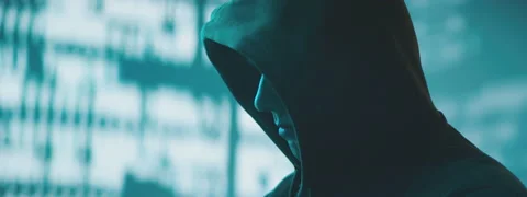 Hacker putting on a hood Stock Footage 149268302