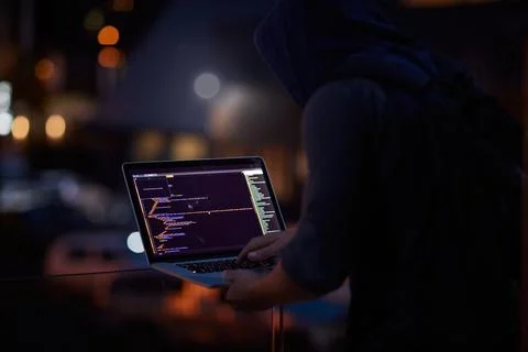 Hacker, ransomware and programming with person and laptop for code, cyber Stock Photos
