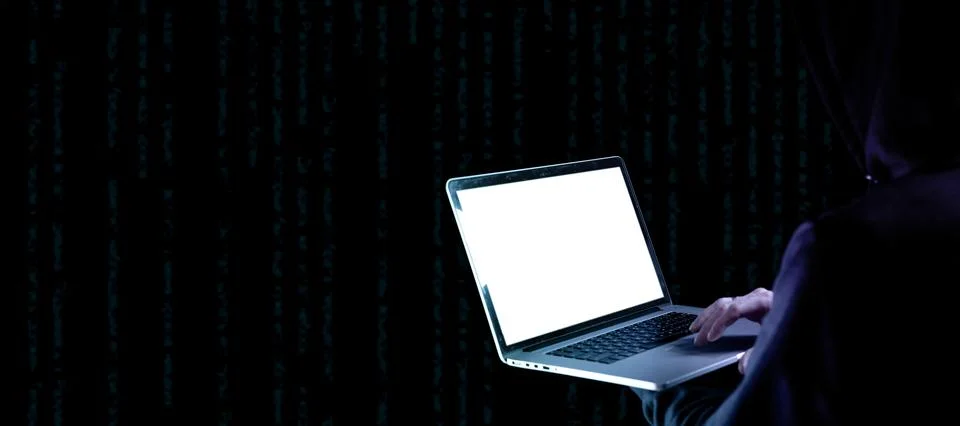Hacker security cyber attack. Digital laptop in hacker man hand isolated on b Foto stock
