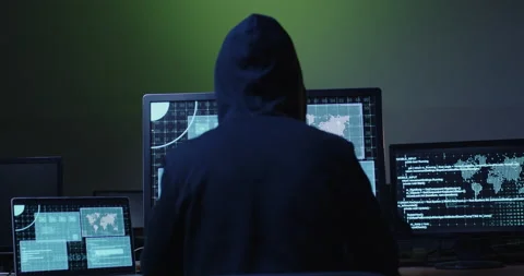 Cyber Hacker Enters Sit Down Examines Stock Footage Video (100