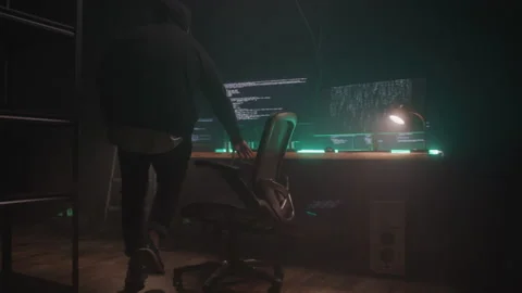 Hacker Sitting Down to Code Stock Footage 208787201