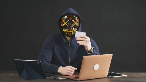 Hacker spreading computer viruses or stealing money from bank card Stock Footage 123473929