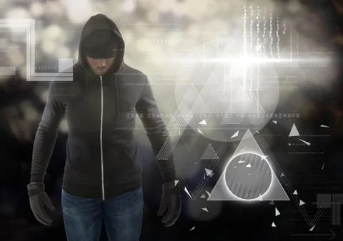 Hacker standing up in front of digital background 写真素材
