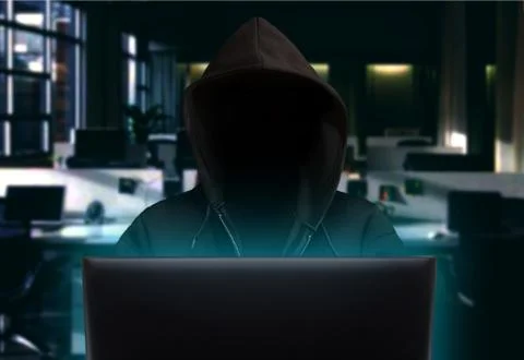Hacker stealing data at night Stock Photos
