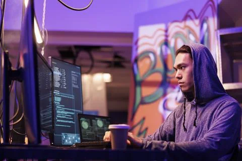 Hacker stealing information from server Stock Photos