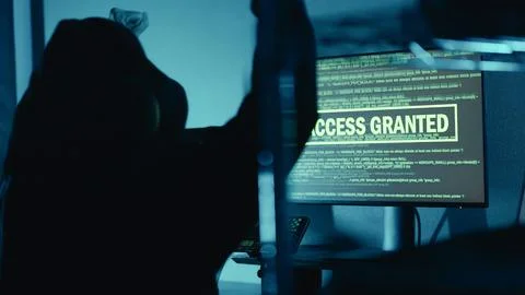 Hacker successfully using code designing virus system, raised hands celebrating. 스톡 사진