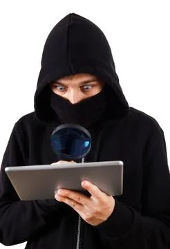 Hacker with a Tablet Stock Photos