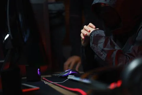 Hacker team looking code on screen concentrated while hacking programming s.. Foto stock