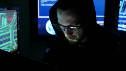 Hacker tries to enter the system using codes and numbers find out security Stock Footage 76014299