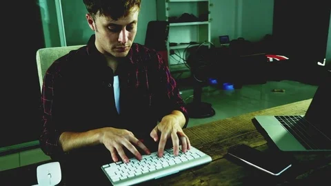 A Hacker Trying to Breached the Computer Password Security Stock Footage 82619544