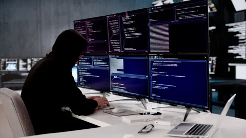 Hacker Types Rapidly On Computer Stock Footage 332498832