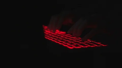 Hacker typing code on laptop at night Stock Footage 113280465