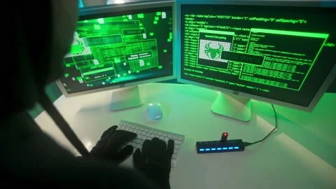 Hacker is typing on a computer keyboard and cracking a password. A man is Stock Footage 233595358