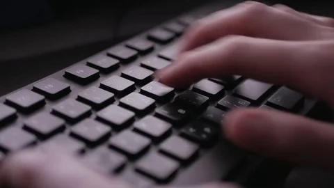 Hacker typing on computer keyboard closeup concept footage Stock Footage 84574141
