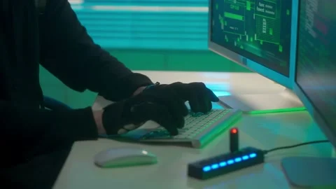 Hacker is typing on a computer keyboard, cracking a password, copies the Stock Footage 233597057