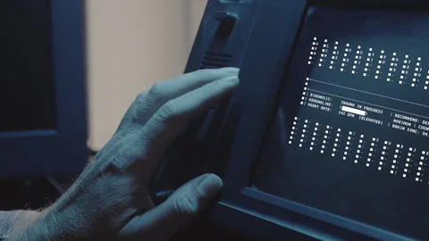 Hacker Typing on Computer Keyboard While Monitoring Digital Information Stock Footage 348913969