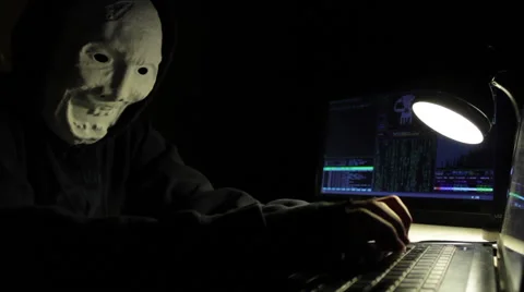 Hacker Typing in Dark Room with Screens Stock Footage 43713033