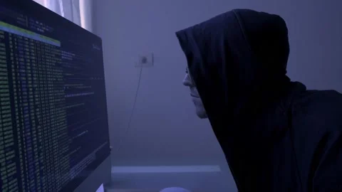 Hacker typing on a desktop computer, coding, and hacking into government Stock Footage 151326796