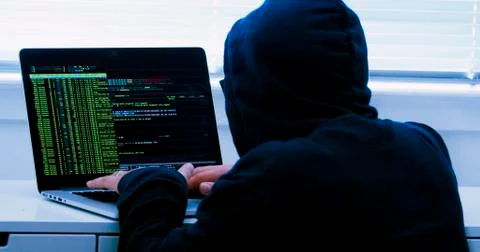 Hacker typing fake dummy code Stock Photos