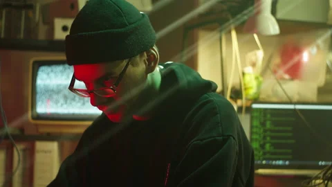 Hacker typing on keyboard at night, breaking password, using laptop and Stock Footage 158927741