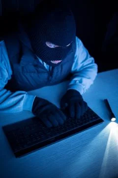 Hacker typing  on keyboard Stock Photos