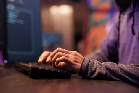 Hacker typing on keyboard, writing code 写真素材
