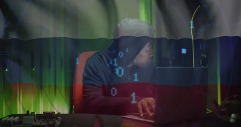Hacker typing on laptop with binary code and Russian flag animation overlay Stock Footage 304767064