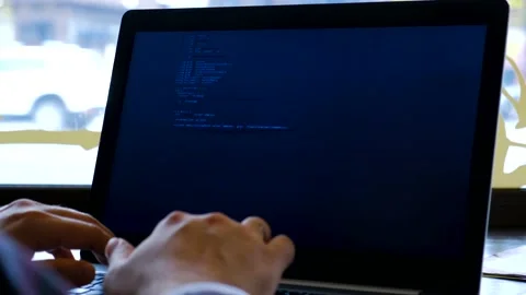 Hacker is typing on a laptop. The programmer writes the program and fails Stock Footage 142166575