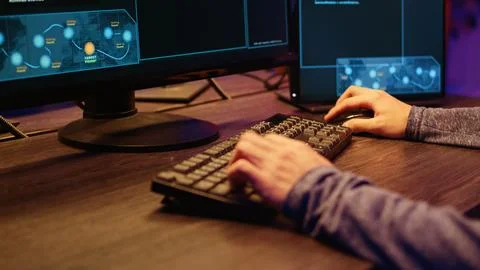 Hacker typing malware code on keyboard 스톡 사진