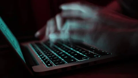 Hacker typing program on a laptop keyboard, time lapse Stock Footage 80694803