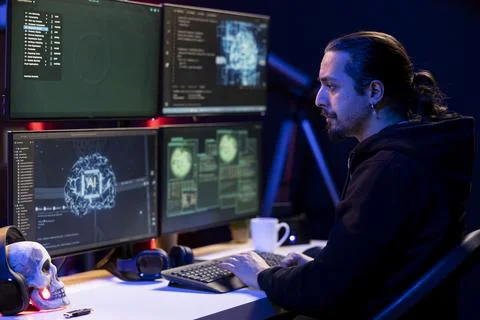 Hacker in underground lair using AI to break into secure computer systems Stock Photos