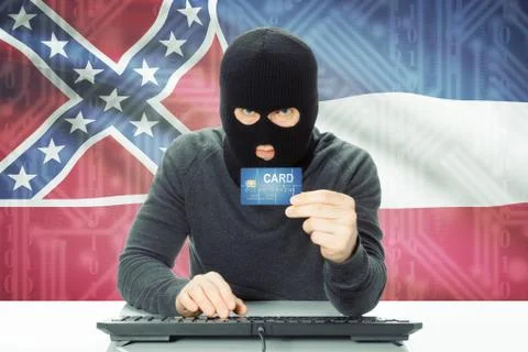 Hacker with US state flag on background - Mississippi 写真素材