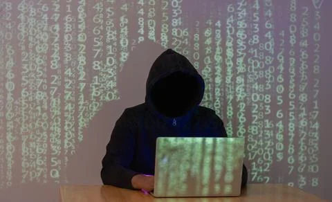 Hacker using abstract laptop  with binary code digital on background. Stock Photos