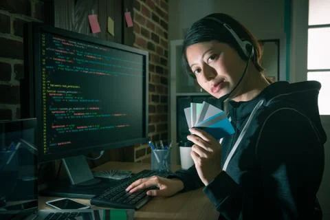 Hacker using code stealing credit card information 写真素材